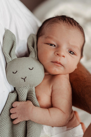 Baby cuddling Sage Organic Cotton Isla Bunny Comforter 