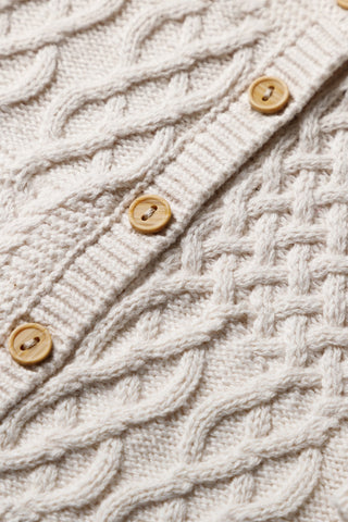 Close up of Organic Cotton Baby Cardigan Cable Stitch and Wooden Buttons