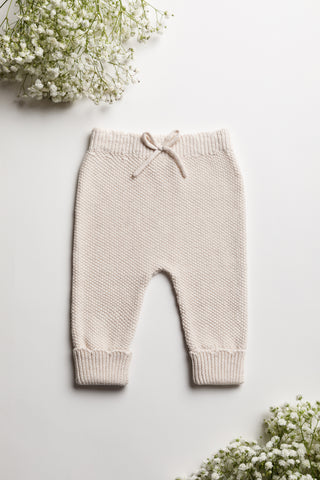 Knitted Baby trousers with a bow and turn up cuffs