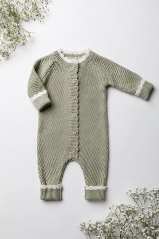 Knitted Sage Green Baby Romper with buttons and white scalloping edging,