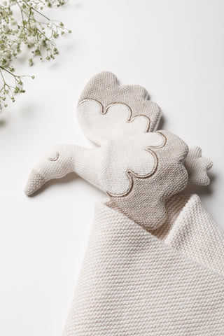 Knitted stork comforter