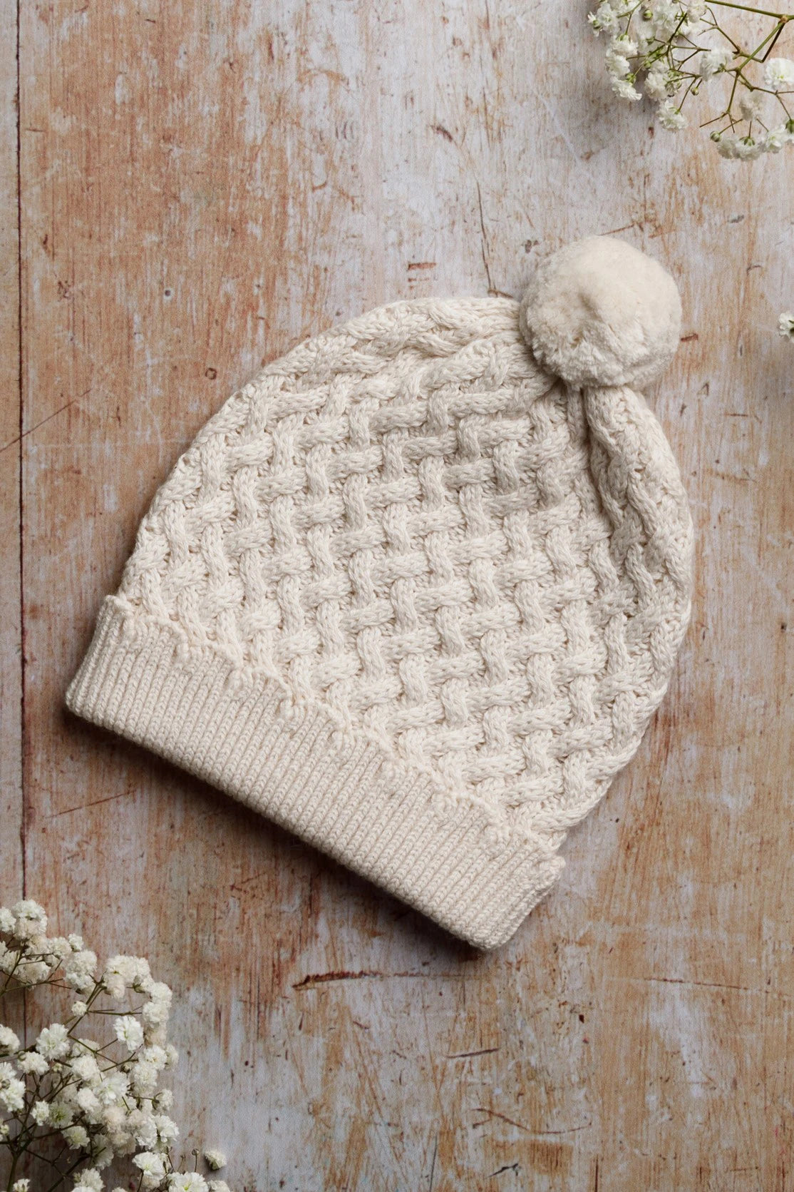 Cable knit top baby hat
