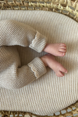 baby feet in moses basket