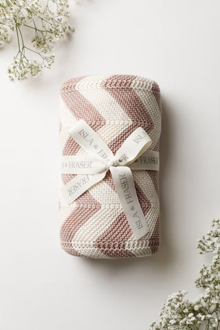 Rose Pink and Cream Chevron Stripe Knitted Baby Blanket tied with Isla & Fraser ribbon