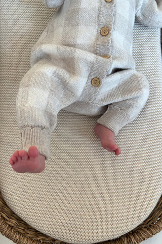 baby feet in moses basket