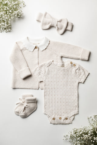 Knitted beige baby gift set