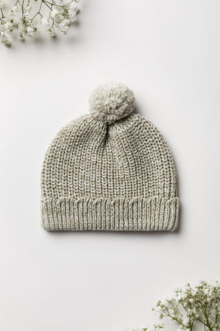Sage green knitted pom pom baby hat