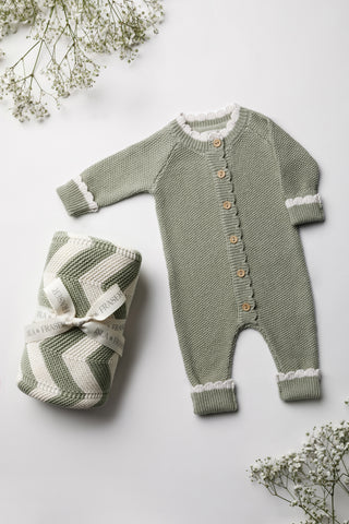 Sage Stripe Baby Blanket tied with an Isla & Fraser ribbon and sage knit romper