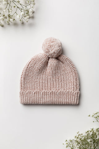 Light pink knitted baby pom pom hat
