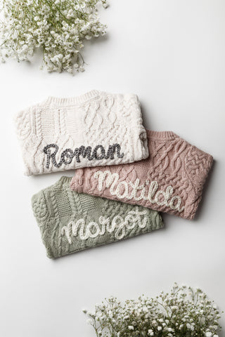 Embroidered personalised named baby cardigans in a cable knit