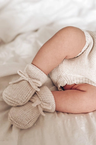 Baby legs wearing Baby Bow Booties