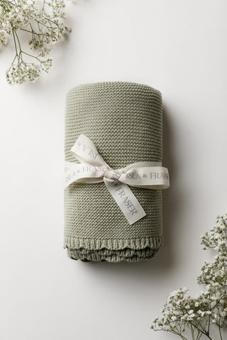 Knitted Organic Cotton Sage Baby Blanket tied with Isla and Fraser ribbon