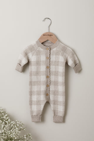 Grey cream gingham check baby romper on an Isla & Fraser hanger