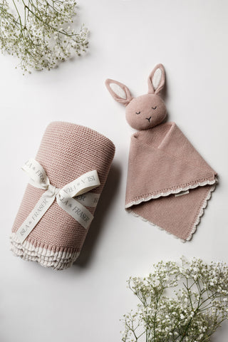 Pink Knitted Blanket tied with an Isla & Fraser ribbon and Pink Knitted Bunny Comforter