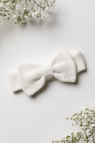 Knitted white bow baby headband
