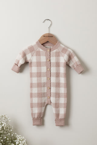 Pink and Cream Checkered Knit Baby Romper on an Isla & Fraser hanger