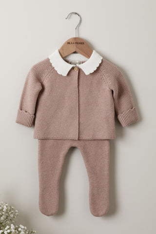 Pink knitted baby girl outfit on wooden Isla & Fraser hanger