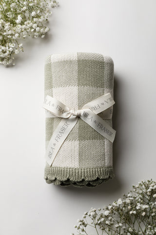 Green and cream check blanket tied with an Isla & Fraser ribbon