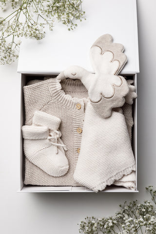 baby gift box containing knitted baby gift set